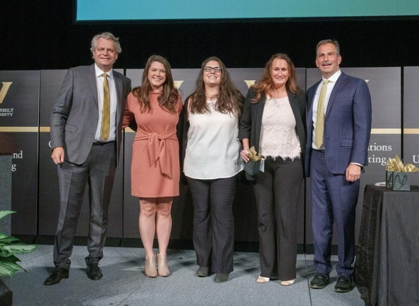 Innovation Excellence Award winners Allison Varble, Beth Rivas and Emma Pacilli with Chancellor Daniel Diermeier (far left) and Vice Chancellor for Administration Eric Kopstain (far right).