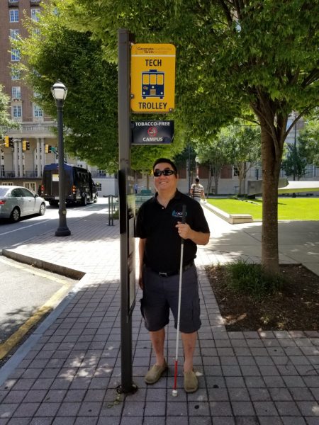 David Furukawa at a trolley stop 