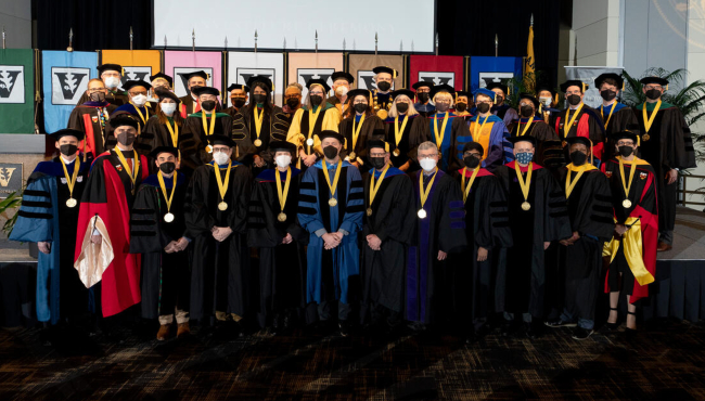 A total of 26 distinguished scholars from seven colleges and schools were recognized at an endowed chair investiture ceremony on campus Feb. 24.