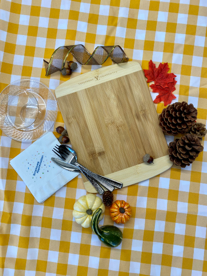 This year's Turkey Toss gift item is a wooden cutting board.