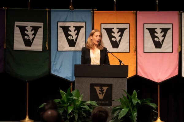 Photograph of Provost Cybele Raver at podium 