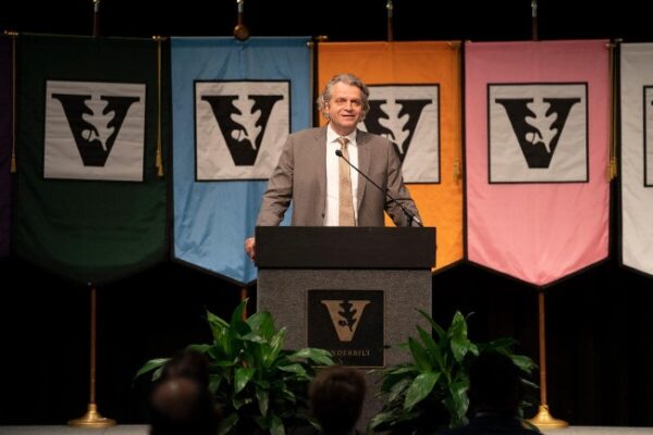 photograph of Chancellor Daniel Diermeier speaking at podium