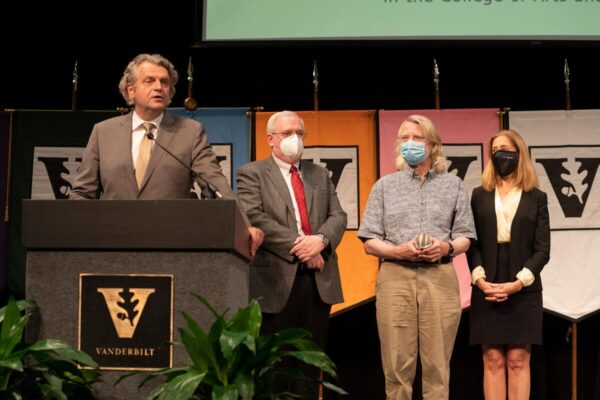 Photograph of Daniel Diermeier, Mark Magnuson, Sutherland Prize winner Gordon Logan and Provost Cybele Raver