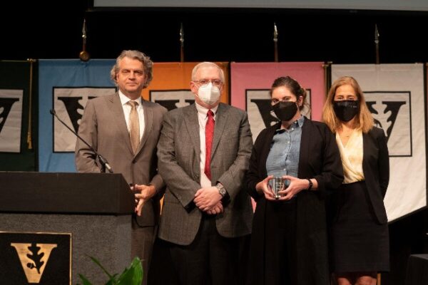 Award winner Sara Mayeux with Daniel Diermeier, Mark Magnuson and Cybele Raver