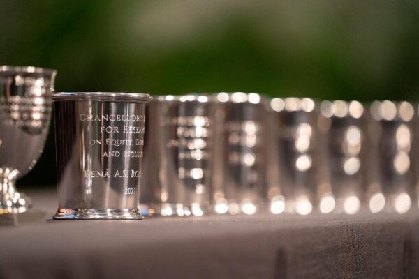 Photograph of pewter goblet and julep cups on table at Fall Faculty Assembly 