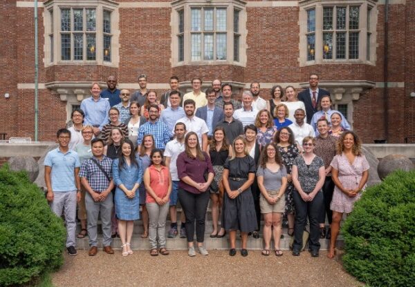 phtograph of 2021 new faculty members on steps of Alumni Hall