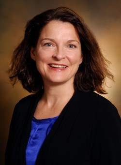 headshot of Vicki Greene in black blazer