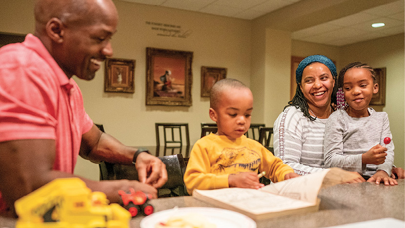 Noble enjoys some downtime in the faculty residence with his wife, Dr. Kristen Noble, BA’03, a fellow in the neonatal intensive care unit at Monroe Carell Jr. Children’s Hopital at Vanderbilt, and their children, Jordan (7) and Rosevelt III (3).