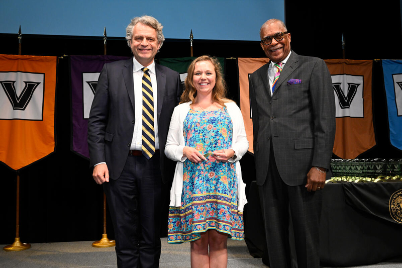 Chancellor Daniel Diermeier, Early Impact Award winner Ashley Haddard and Dr. André Churchwell (John Amis)