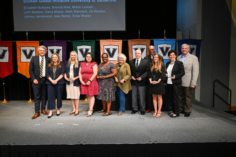 Chancellor Daniel Diermeier (far left) is pictured with staff members from across campus who were vital to the success of Clinton Global Initiative University at Vanderbilt. They received the One Vanderbilt Excellence Award. (John Amis)