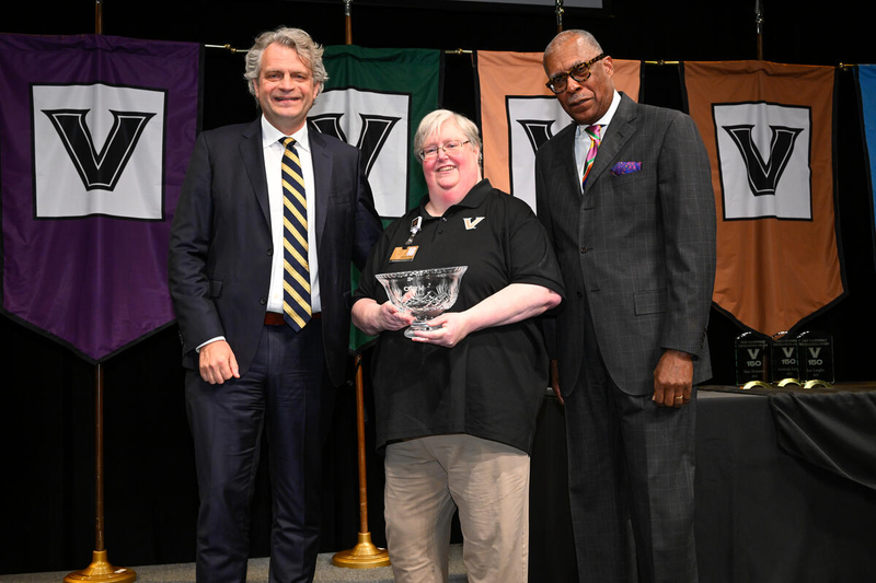 Chancellor Daniel Diermeier, Commodore Award winner Kathy Smith and Dr. André Churchwell (John Amis)