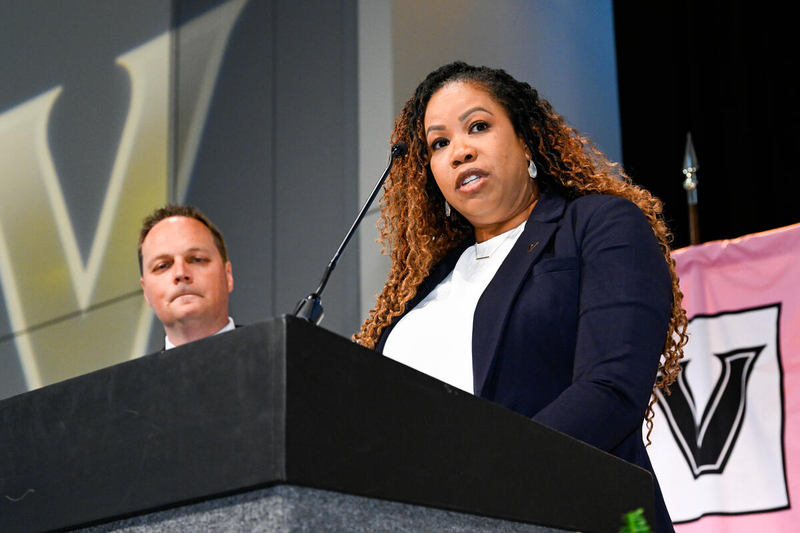 Adam McKeever-Burgett (left) and Jennifer Bennett represented the University Staff Advisory Council at the Spring Staff Assembly. (John Amis)