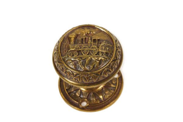 Cast brass doorknob showing a train that was once in Bishop Holland McTyeire's home, circa 1875, now in University Archives