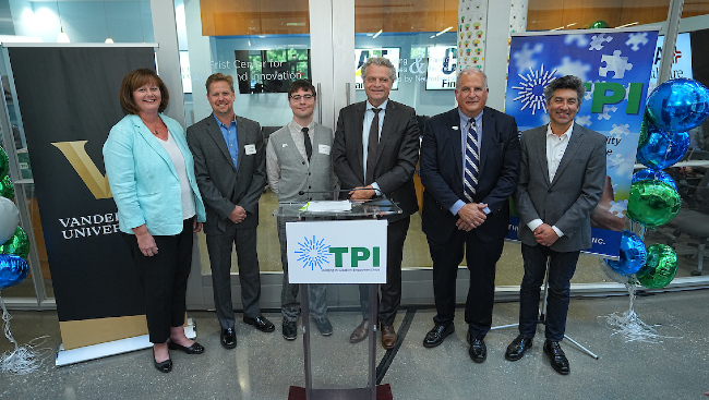 From left to right: Nicole Tremblett, vice president, HCA Healthcare Information Technology Group; Tyson Norman, vice president and CIO, Cat Financial; Kurt Jones, The Precisionists, Inc., software tester supporting the HCA Healthcare project; Vanderbilt University Chancellor Daniel Diermeier; Ernie Dianastasis, CEO, The Precisionists, Inc.; and Keivan Stassun, director of the Frist Center for Autism and Innovation at Vanderbilt and Stevenson Professor of Physics and Astronomy (Harrison McClary/Vanderbilt)