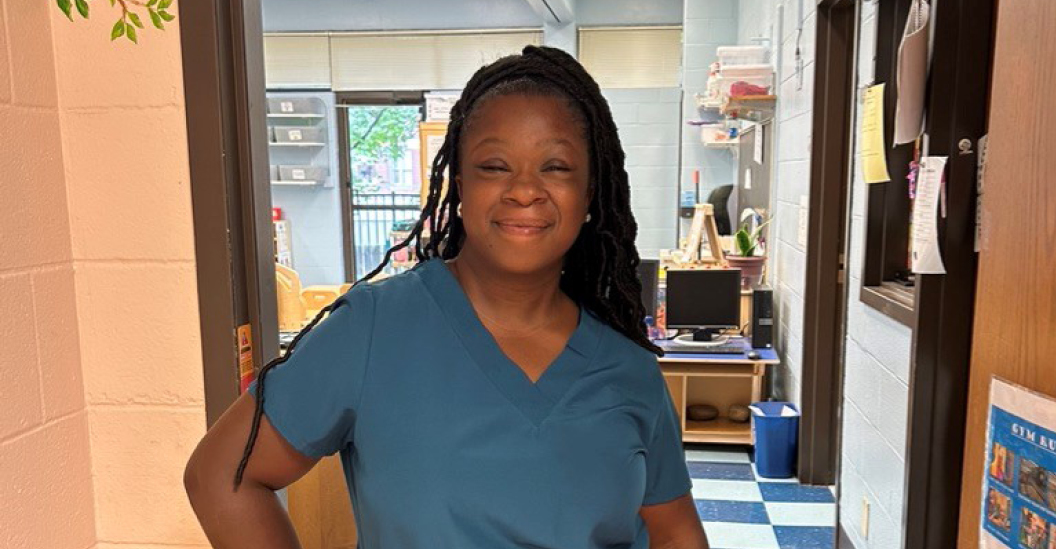 Young Black woman working at an internship