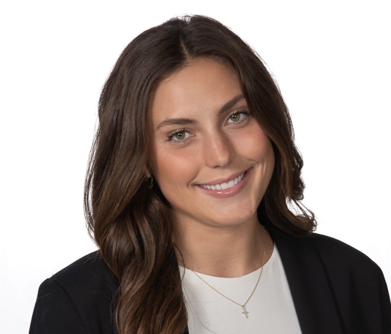 woman in black blazer and white blouse