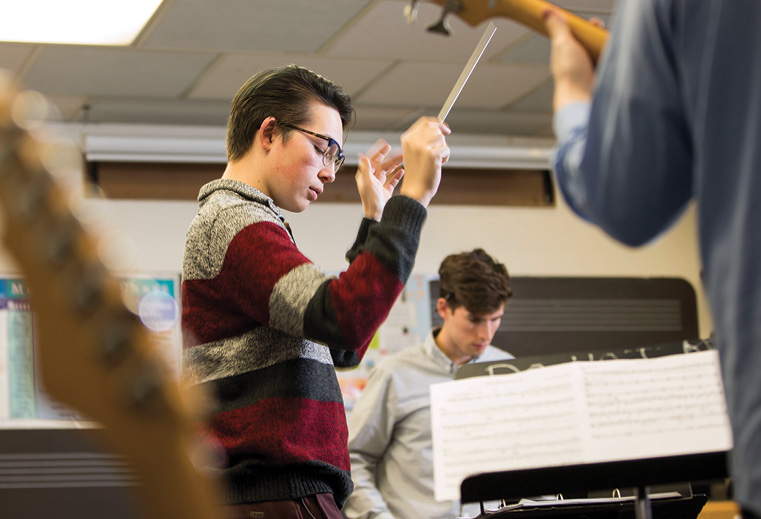 Blair student composer Nicholas Heilborn rehearses his composition with chatterbird chamber ensemble musicians