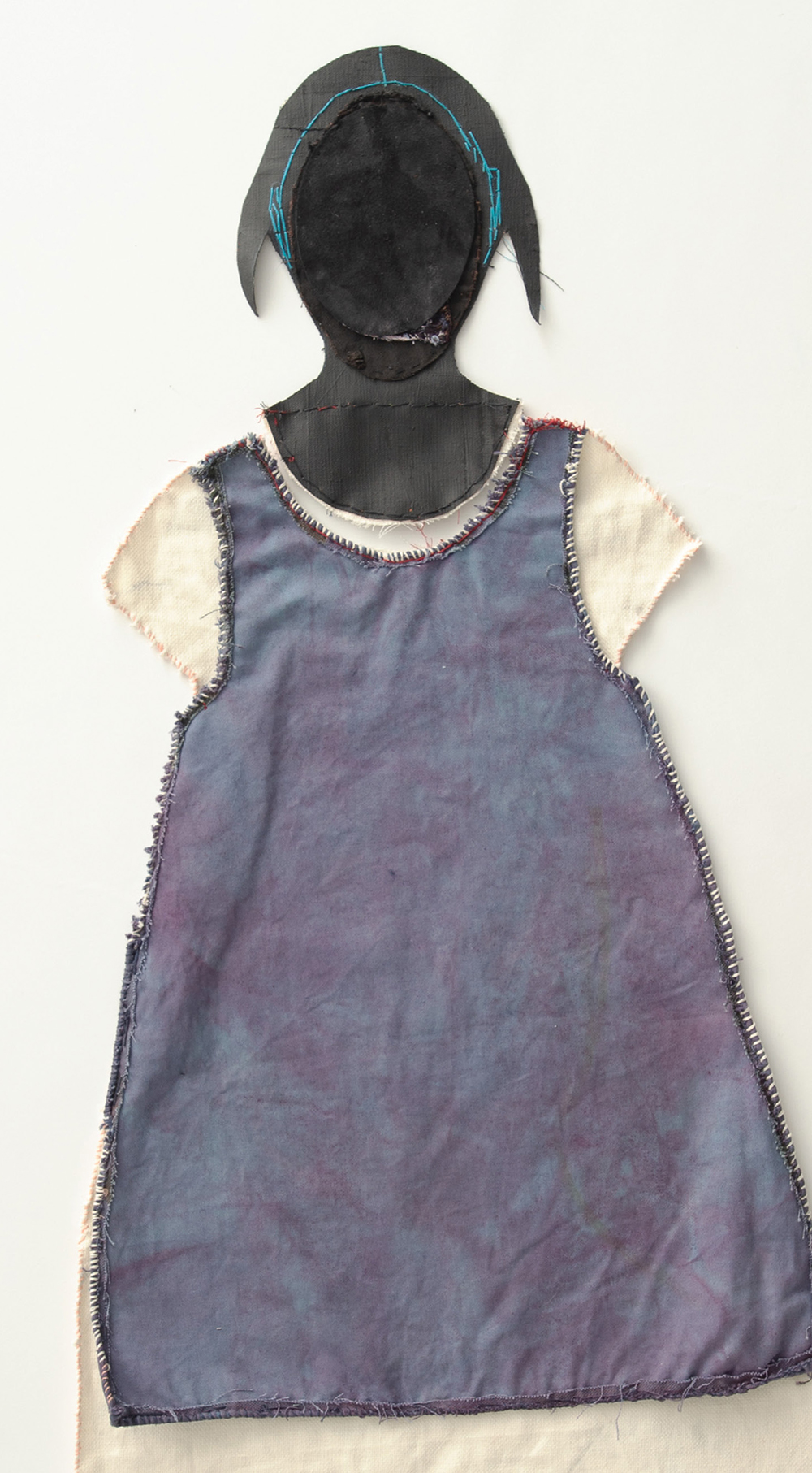 Mixed media assemblage of clothes for a young black woman