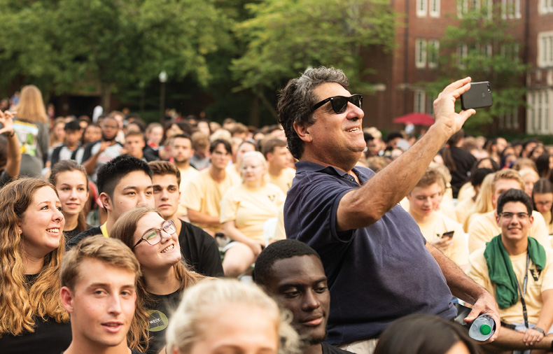 photo of Chancellor Zeppos taking a selfie with students