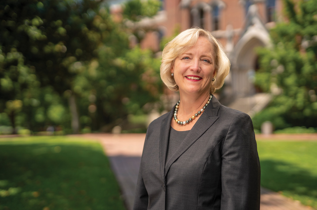 photo of Susan R. Wente in front of Kirkland Hall