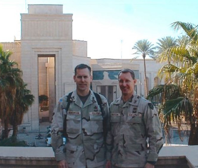 LTC Michael Newton pictured in fatigues with another soldier. http://law.vanderbilt.edu/newton