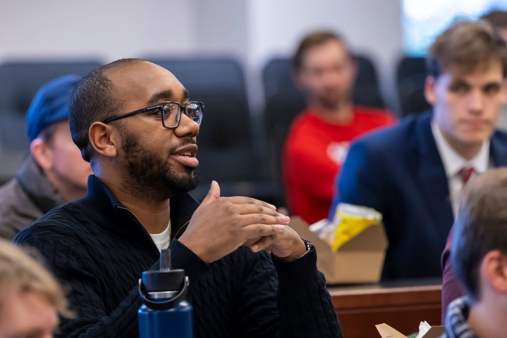 student speaking during black ceiling MLK lecture