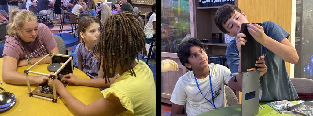 Campers and counselors work to construct model Hubble Telescopes