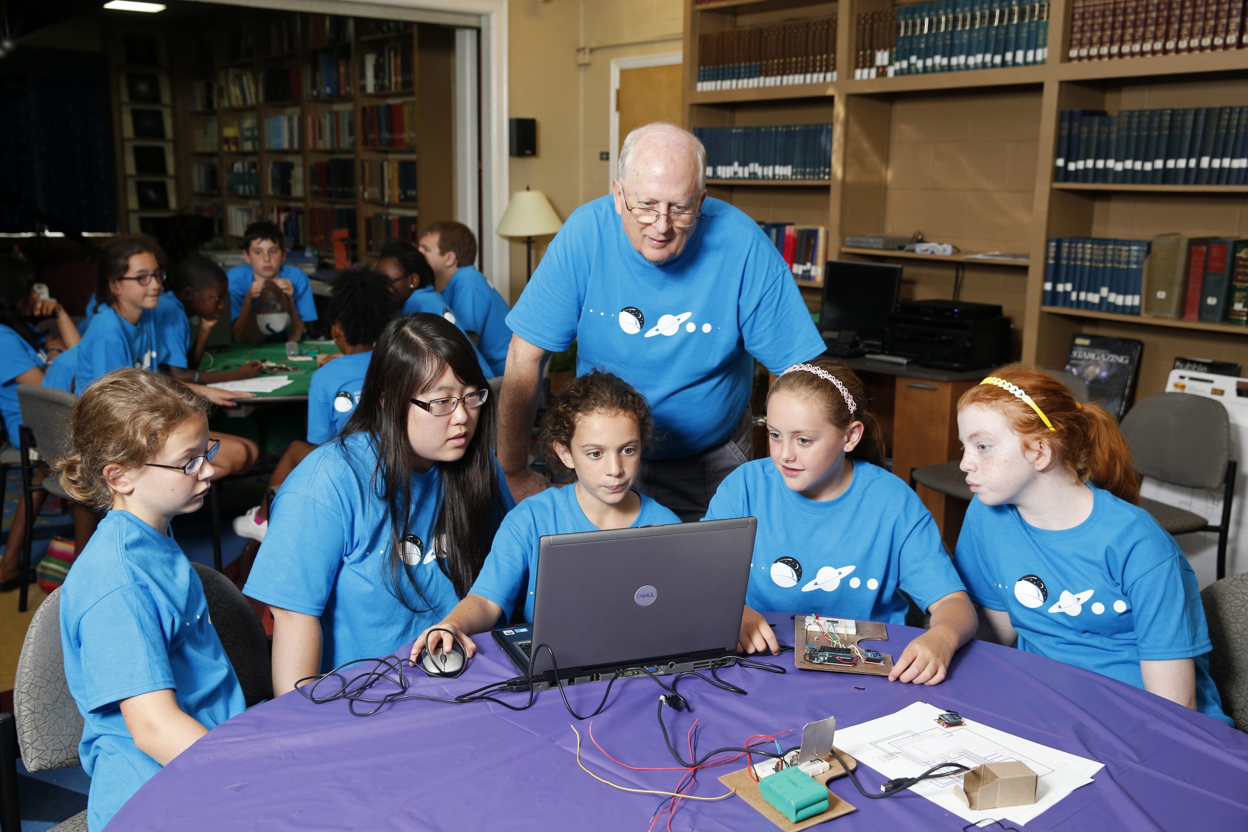 Students with their models of the Hubble Space Telescope