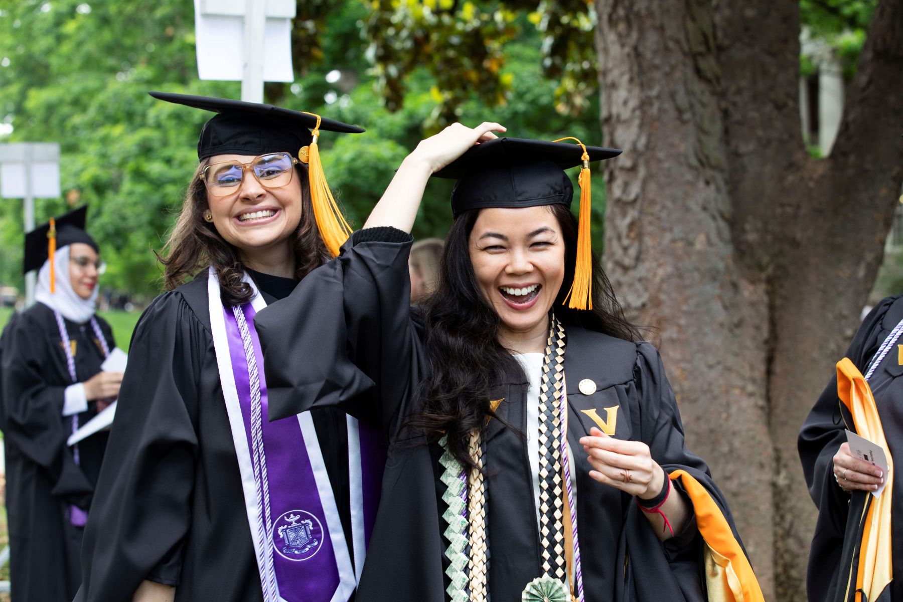 Graduate celebrating at graduation