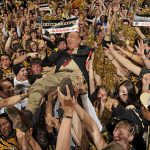 ESPN commentator Dick Vitale crowd surfs across Memorial Gymnasium before the VU-Kentucky game.