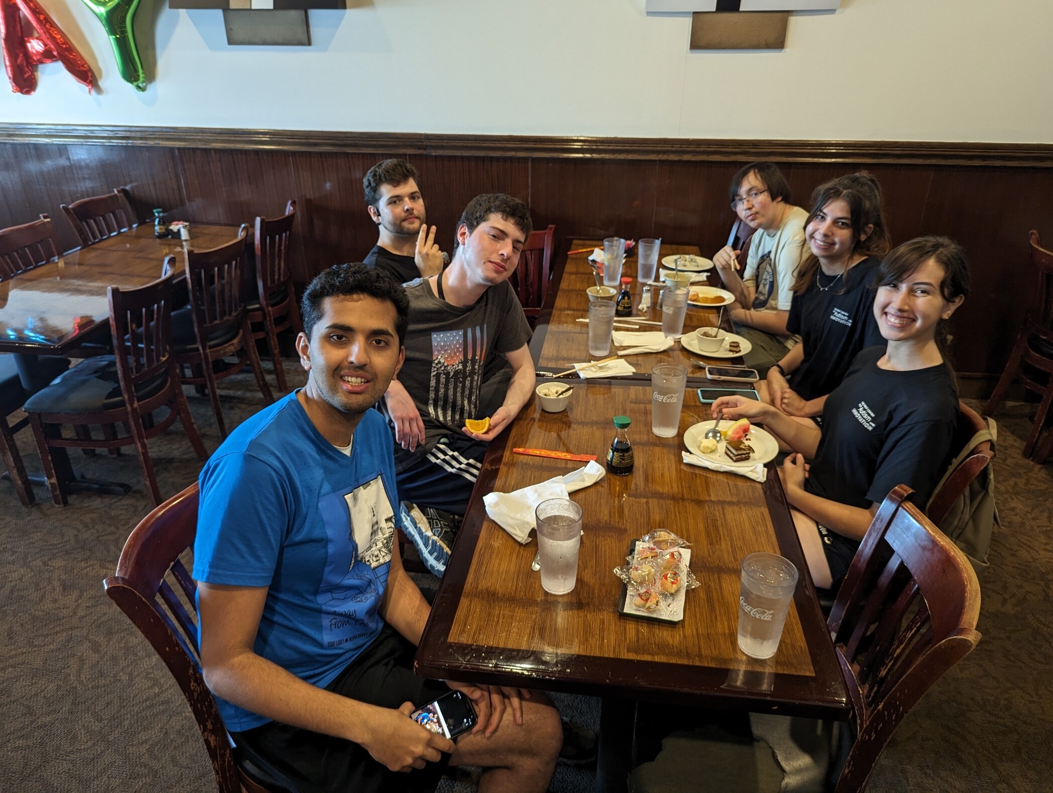 Autism Summer Interns from 2023 share a meal with FCAI Associate Director Dave Caudel during their summer internships.