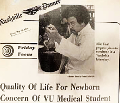 Nashville Banner newspaper article photo of Michael Fant wearing a lab coat and working on an experiment.
