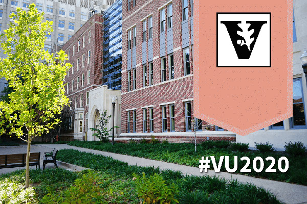 Exterior of the VUSN building with an apricot banner & #VU2020