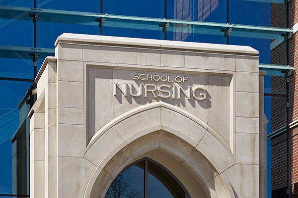 School of Nursing carved in limestone arch