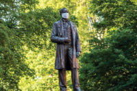 Cornelius Vanderbilt statue with mask