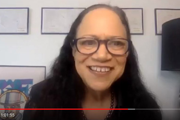 Author Alice Randall in a videoconference presentation looking right at the camera and smiling