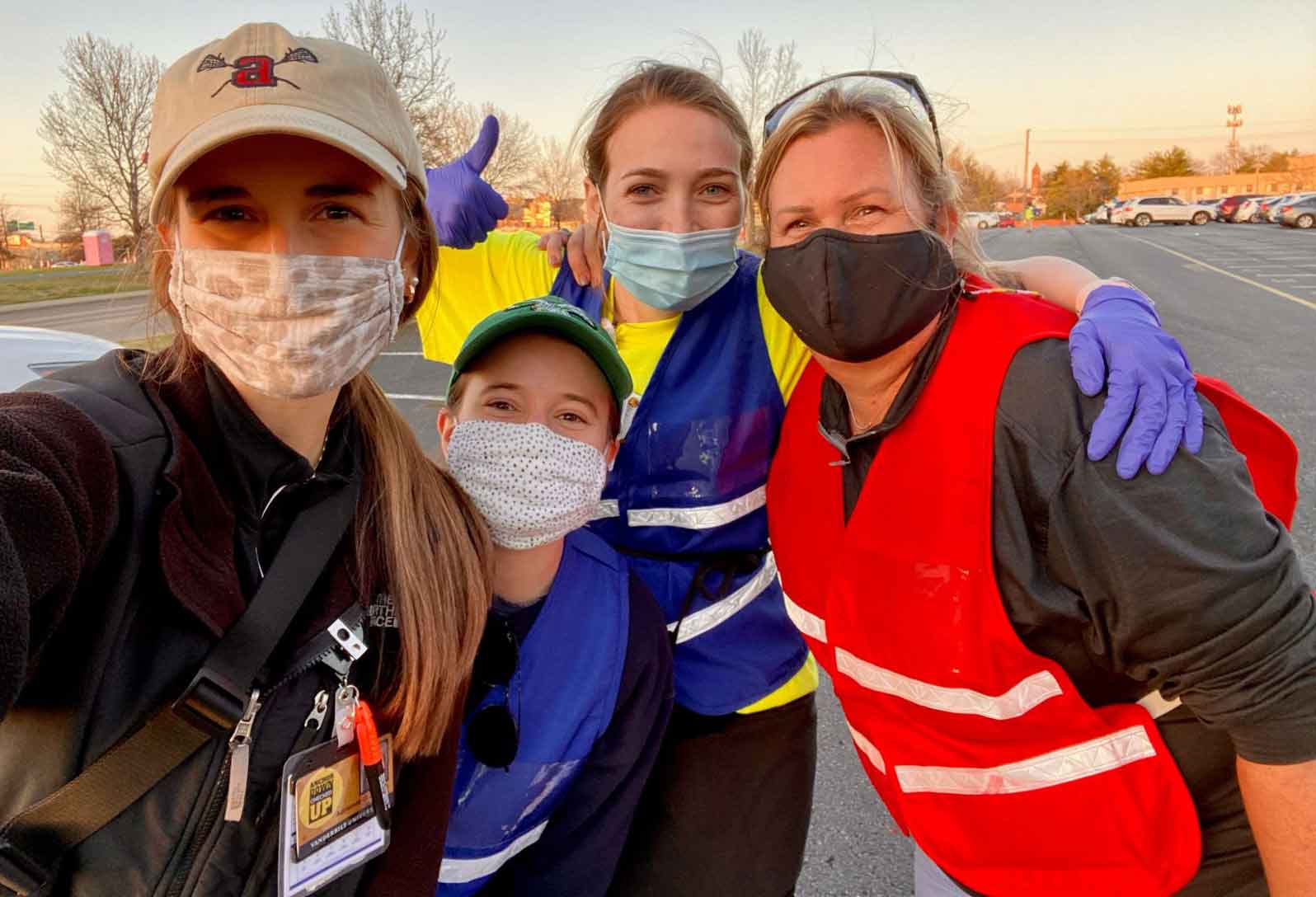 Vanderbilt students and faculty in masks and safety vests 