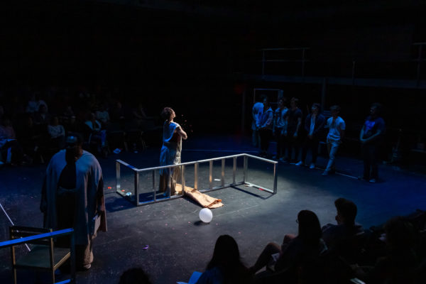 actress playing Antigone onstage