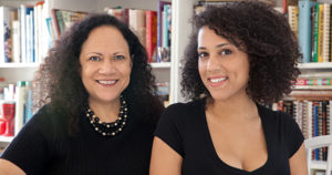 Alice Randall and Caroline Randall Williams in front of a bookcase full of books