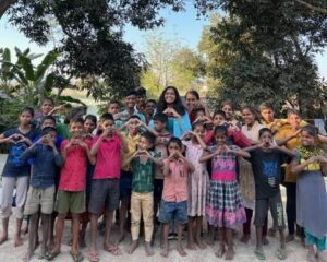 Group of children and adults outside