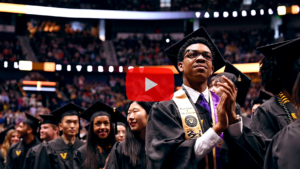 video thumbnail: graduating students in arena, clapping