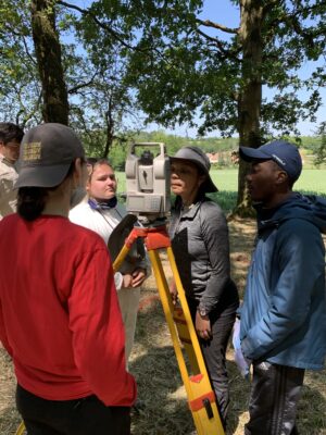 A photo of students collecting data at the field site in France.