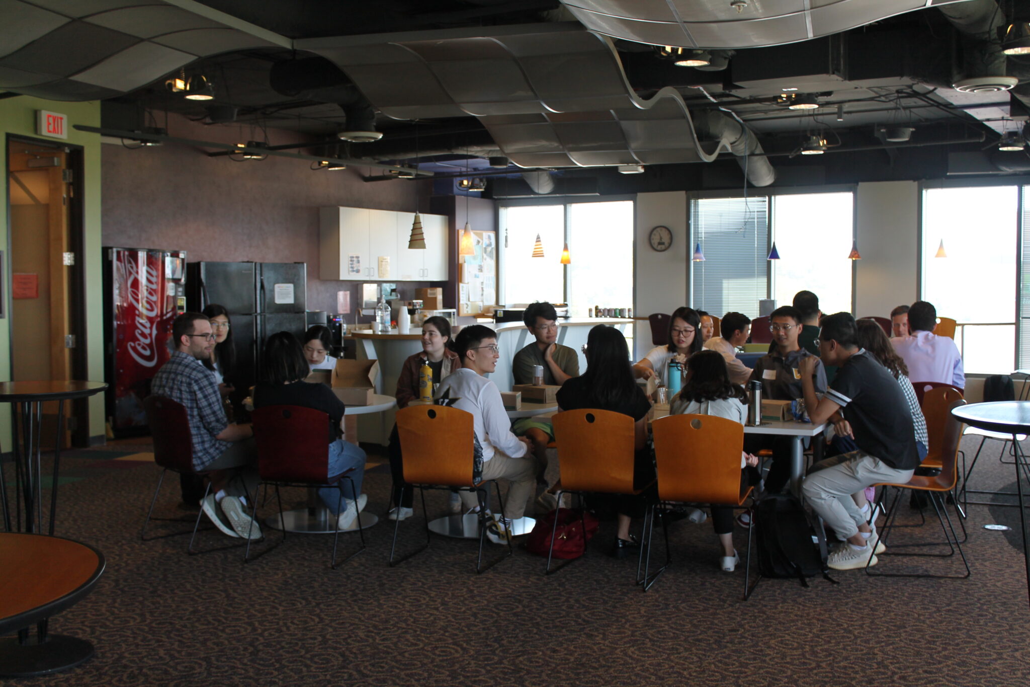 New and returning students socialize over lunch during orientation (August 18, 2023).